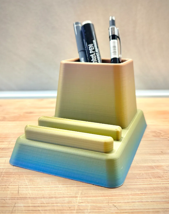 Phone Stand With Pen Holder 3 — 3D printed by Moon Studio 3D
